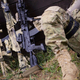 Illustration for article titled How the Worlds Top Assault Rifle Is Rebranding As a Weapon of Peace